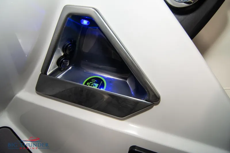 Slide: The Image of Control panel of 2022 JC NEPTOON 25 TT SPORT boat with blue LED lighting. - 34