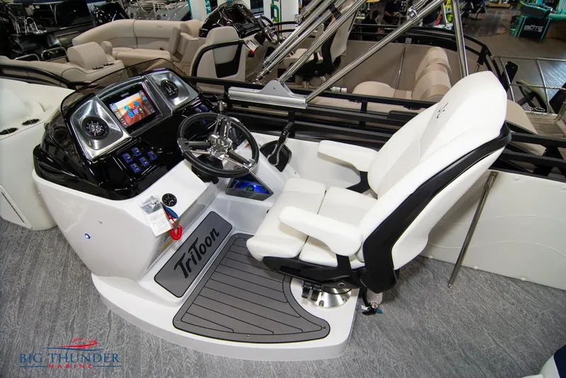 Slide: The Image of 2022 JC NEPTOON 25 TT SPORT boat cockpit with steering wheel and control panel. - 36