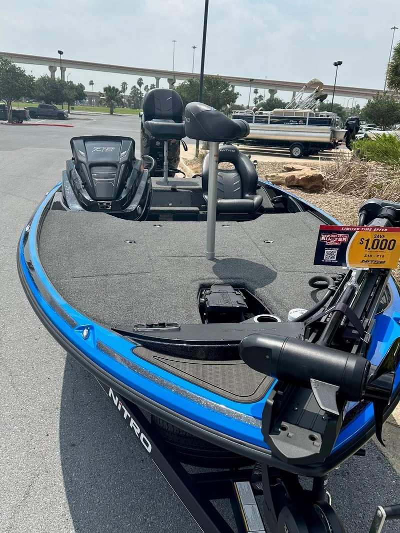 Slide: The Image of 2023 Nitro Z18 fishing boat with blue trim on display. - 5
