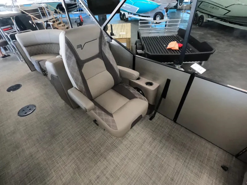 Slide: The Image of Captain's chair in a 2023 Vanderbilt 700T boat, featuring luxurious seating and modern design. - 11