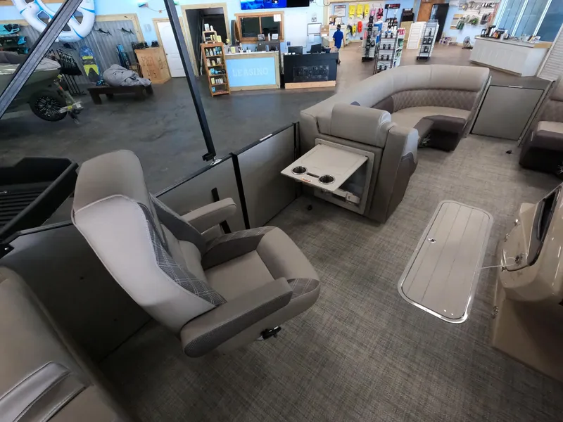 Slide: The Image of 2023 Vanderbilt 700T boat interior with plush seating and modern amenities. - 13