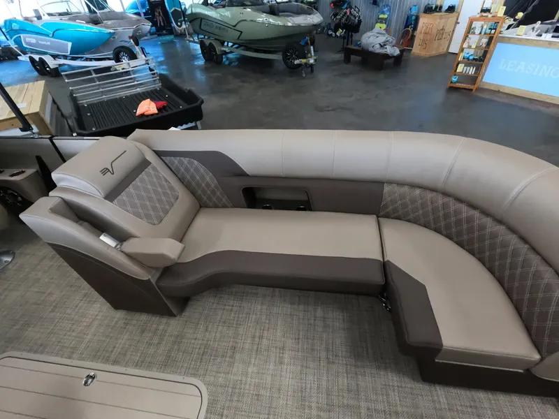 Slide: The Image of Vanderbilt 700T 2023 model boat interior with luxurious seating in showroom. - 15