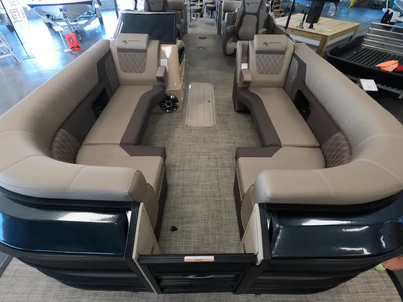 Slide: The Image of 2023 Vanderbilt 700T luxury pontoon boat interior with spacious seating. - 18
