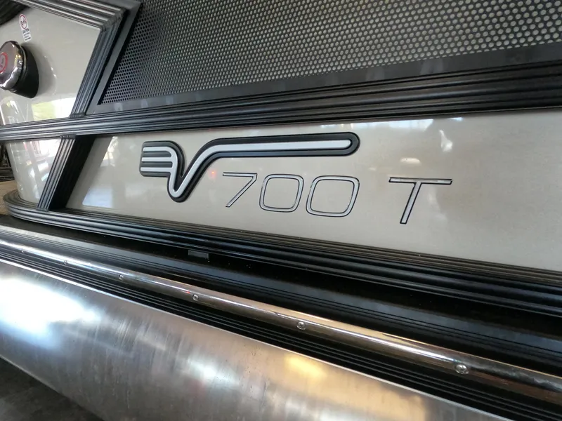 Slide: The Image of Vanderbilt 700T 2023 model close-up, showcasing sleek design and logo. - 2