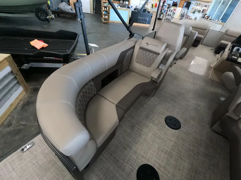 Slide: The Image of 2023 Vanderbilt 700T boat interior with beige seating and modern design. - 5
