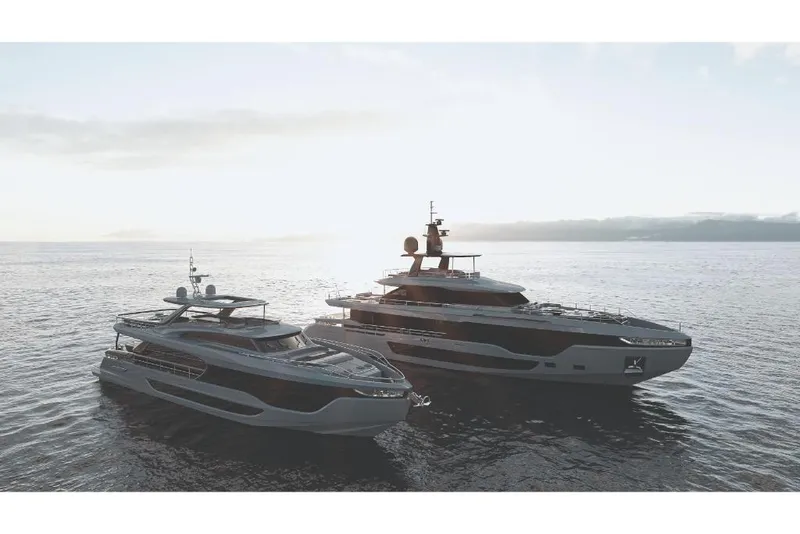 Slide: The Image of Two Azimut Grande 36M yachts on calm water at sunset, 2023 model. - 6