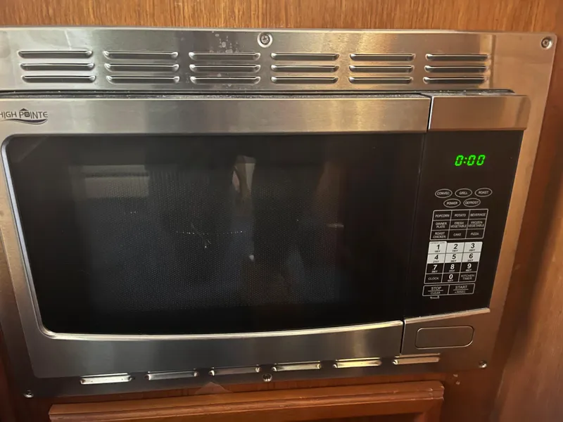 Slide: The Image of Built-in microwave in 1989 Egg Harbor 33 Sedan boat kitchen. - 25