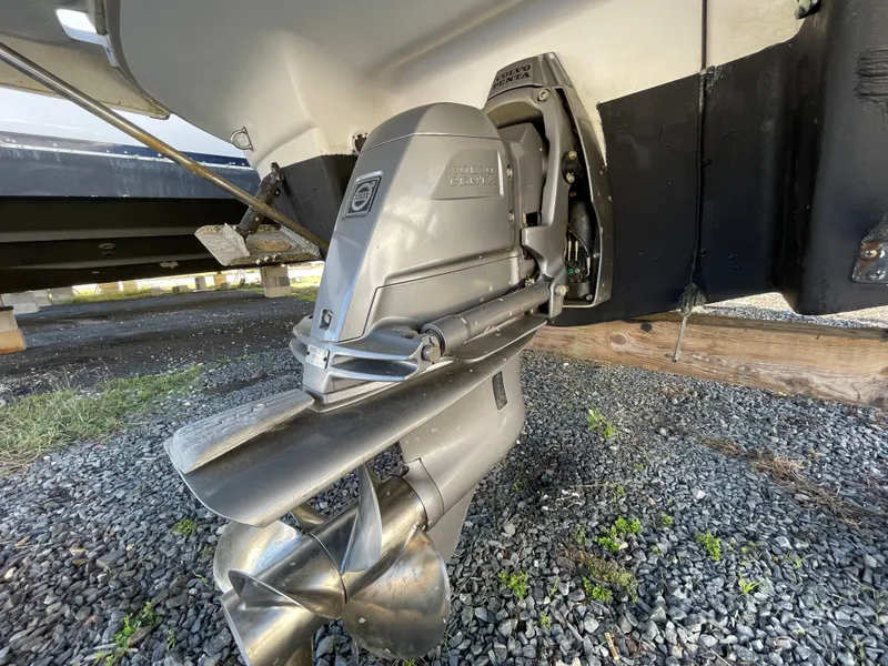 Slide: The Image of Close-up of the 2006 Regal 2665 Commodore boat's outdrive and propeller. - 27