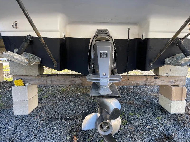 Slide: The Image of 2006 Regal 2665 Commodore boat stern with propeller and outdrive. - 28