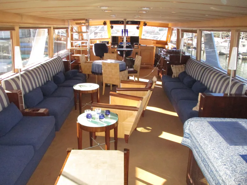 Slide: The Image of Luxurious 1984 McQueen Flush Deck Motoryacht interior with spacious seating and elegant decor. - 46
