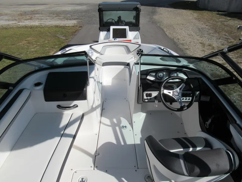 Slide: The Image of 2015 Yamaha Boats AR192 interior cockpit view with steering wheel and seating. - 10