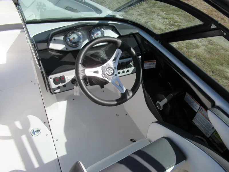 Slide: The Image of 2015 Yamaha Boats AR192 dashboard and steering wheel. - 11