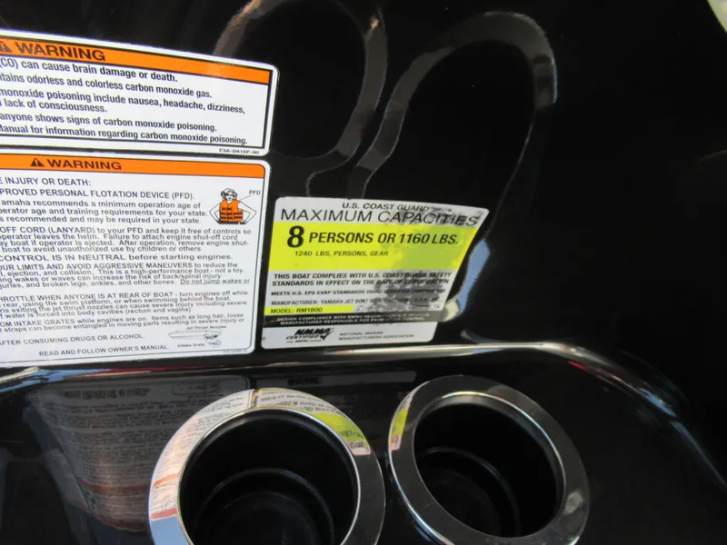 Slide: The Image of Warning labels on 2015 Yamaha Boats AR192, maximum capacity 8 persons or 1160 lbs. - 12