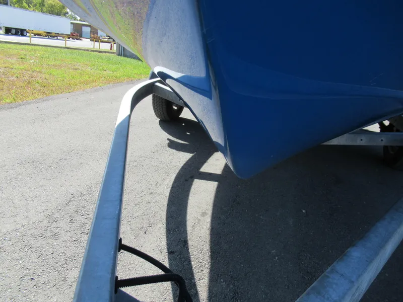 Slide: The Image of 2015 Yamaha Boats AR192 on a trailer, close-up of the hull and trailer frame. - 7