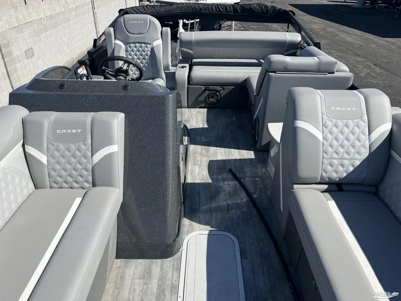 Slide: The Image of 2023 Crest 240 Classic Platinum boat interior with luxurious gray seating and modern design. - 3