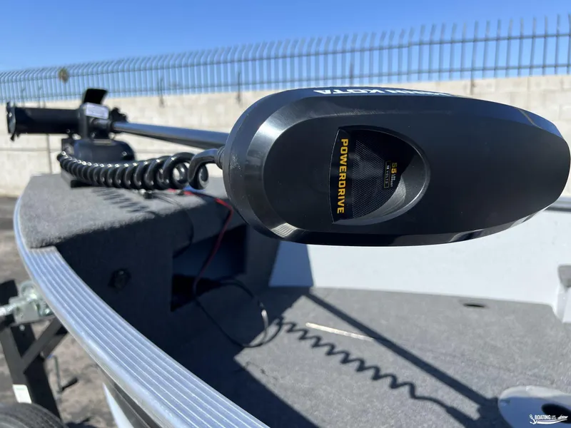 Slide: The Image of 2023 Lund Fury 1600 SS boat with PowerDrive trolling motor, close-up view. - 2