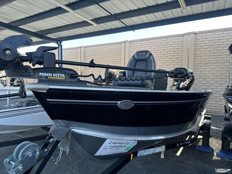 Slide: The Image of 2023 Lund Fury 1600 SS fishing boat with Minn Kota PowerDrive motor. - 5
