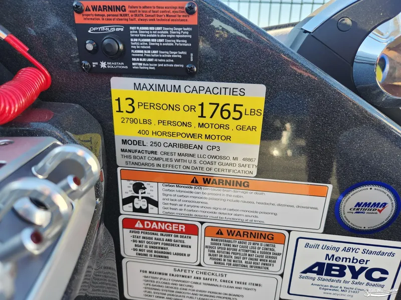 Slide: The Image of Capacity label on 2023 Crest Caribbean RS 250 SLS boat, 13 persons or 1765 lbs, 400 HP motor. - 10