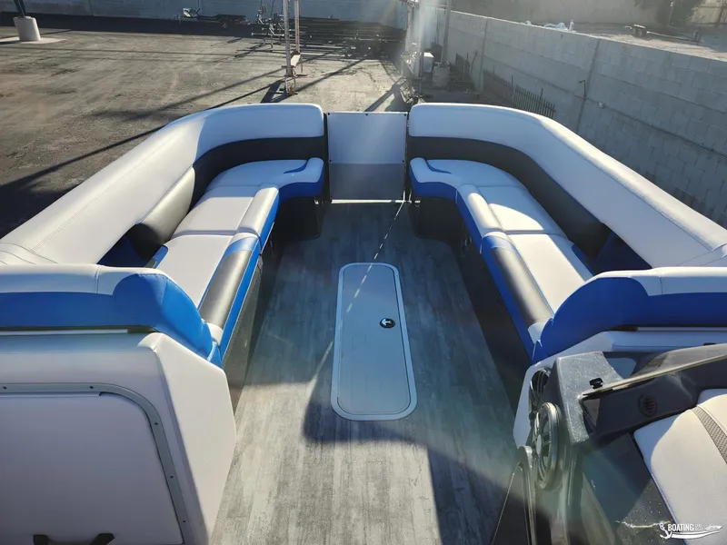 Slide: The Image of 2023 Crest Caribbean RS 250 SLS boat interior with spacious seating and modern design. - 6