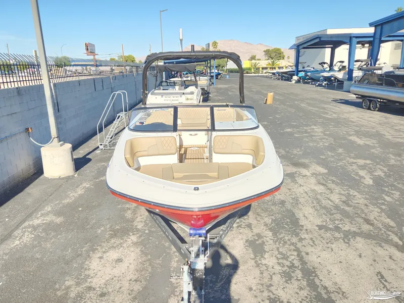 Slide: The Image of 2023 Bayliner VR6 boat on trailer in outdoor showroom. - 4