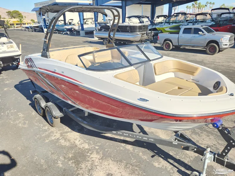 Slide: The Image of 2023 Bayliner VR6 boat on trailer in outdoor showroom. - 5