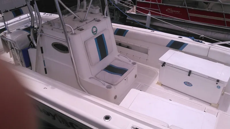 Slide: The Image of Al Dhaen 360 Open Fisher 2000 model boat interior with seating and storage. - 11