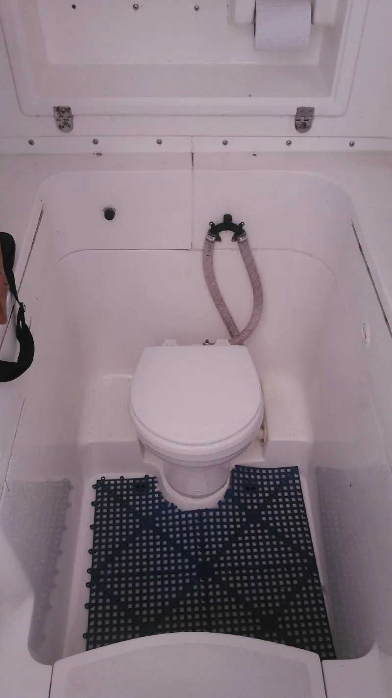 Slide: The Image of Boat toilet on a 2000 Al Dhaen 360 Open Fisher. - 12