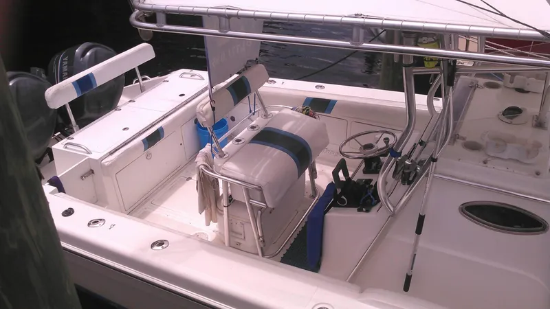 Slide: The Image of 2000 Al Dhaen 360 Open Fisher boat interior with Yamaha engines. - 13