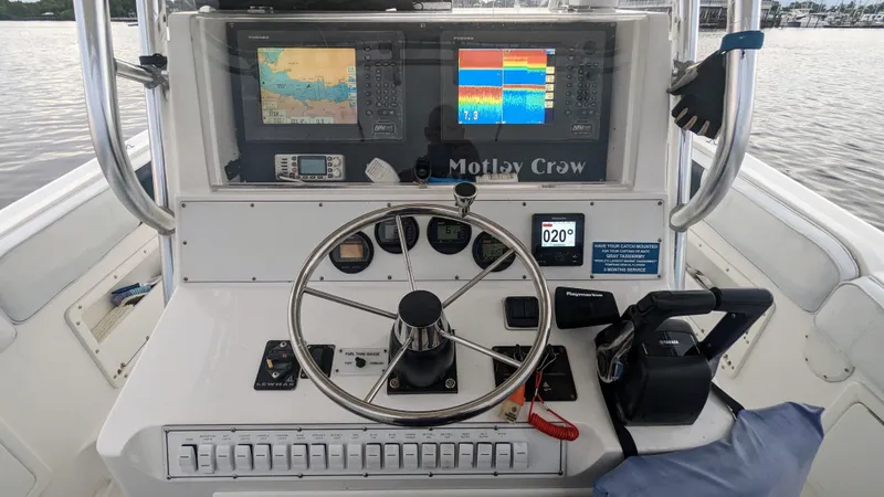Slide: The Image of 2000 Al Dhaen 360 Open Fisher boat dashboard with navigation and control systems - 6
