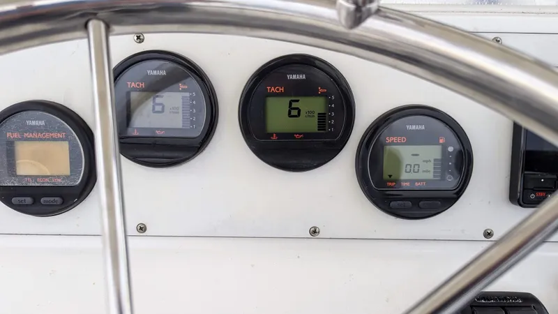 Slide: The Image of Close-up of Yamaha gauges on a 2000 Al Dhaen 360 Open Fisher boat. - 9