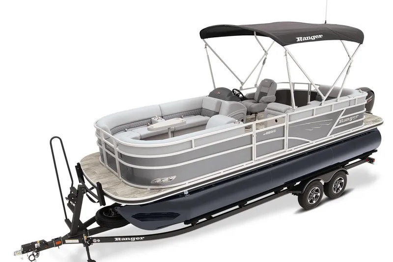 Slide: The Image of 2023 Ranger Reata 223C pontoon boat with canopy on trailer. - 7