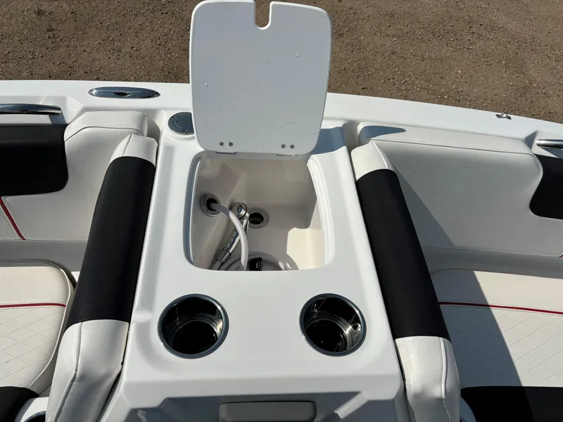 Slide: The Image of Tahoe 1950 boat interior, 2023 model, featuring cup holders and storage compartment. - 15