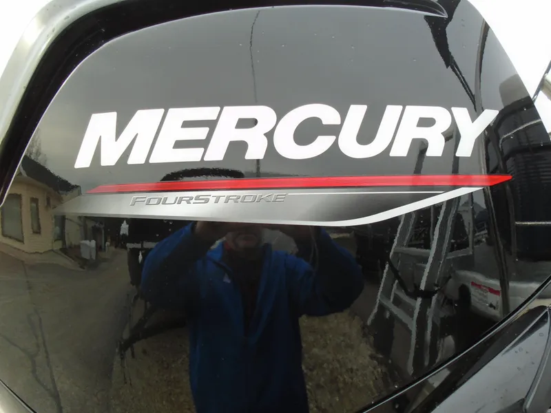 Slide: The Image of Mercury FourStroke engine on a 2023 Sweetwater 2086C boat. - 10