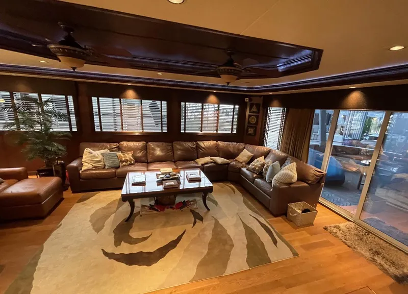 Slide: The Image of Luxurious Sumerset 23' x 118' 2009 houseboat interior with leather sectional and elegant decor. - 15