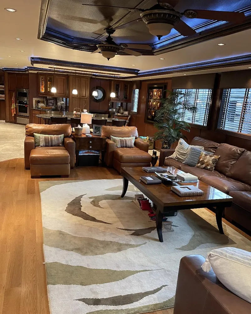 Slide: The Image of Luxurious 2009 Sumerset houseboat interior with modern living area and kitchen. - 18