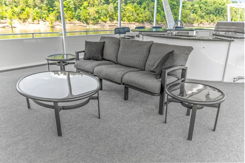 Slide: The Image of Outdoor seating area on 2009 Sumerset 23' x 118' houseboat with glass tables and sofa. - 28