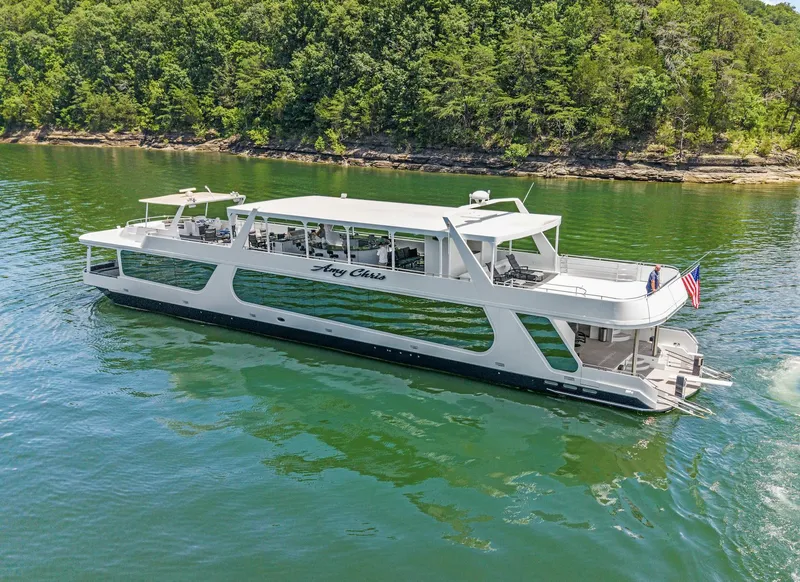 Slide: The Image of Luxurious 2009 Sumerset 23' x 118' houseboat cruising on a scenic lake. - 3