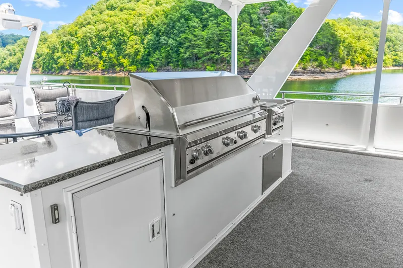 Slide: The Image of Outdoor kitchen on 2009 Sumerset houseboat with scenic lake view. - 31