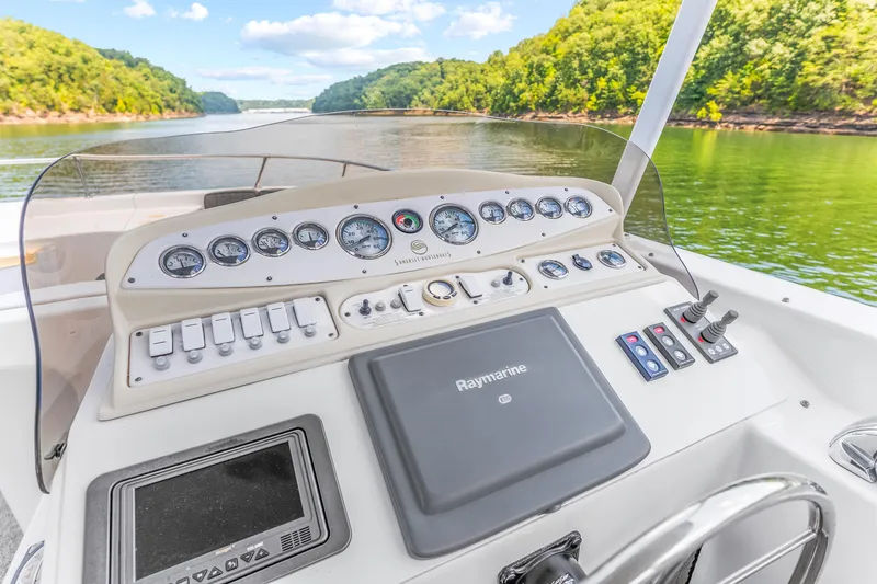 Slide: The Image of Helm of 2009 Sumerset 23' x 118' houseboat with Raymarine navigation, on scenic river. - 36