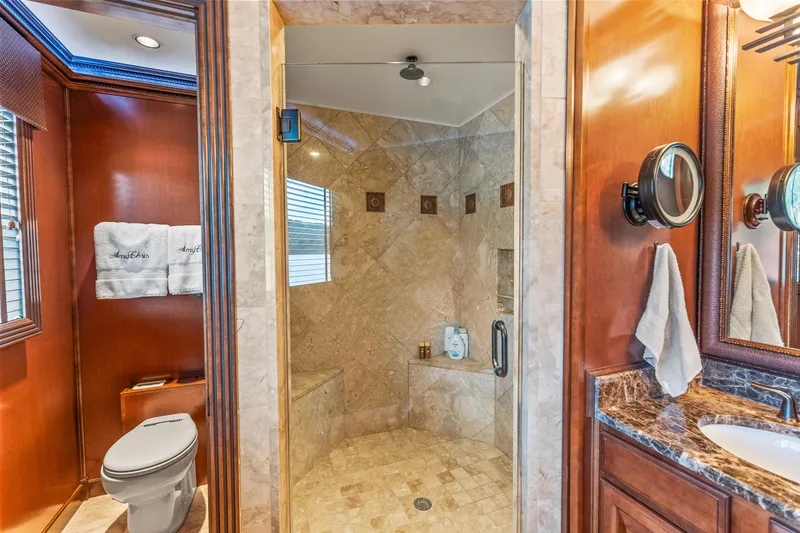 Slide: The Image of Luxurious bathroom in 2009 Sumerset houseboat with marble shower and elegant wood finishes. - 44