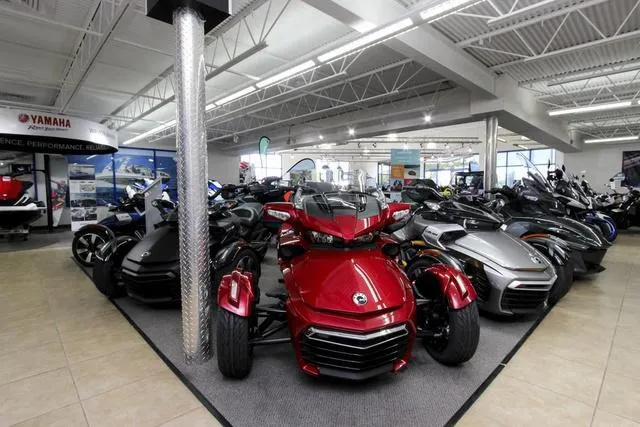 Slide: The Image of Showroom displaying 2023 Yamaha Waverunners Waverunner Superjet® and various motorcycles. - 16