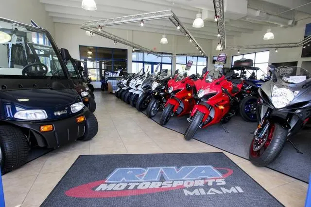 Slide: The Image of Showroom with Yamaha Waverunners Waverunner Superjet® 2023 and motorcycles at Riva Motorsports Miami. - 20