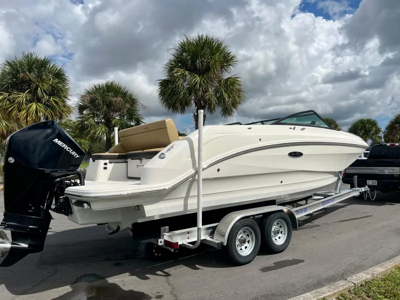 Slide: The Image of 2020 Sea Ray SDX 250 boat on trailer with Mercury outboard motor. - 3