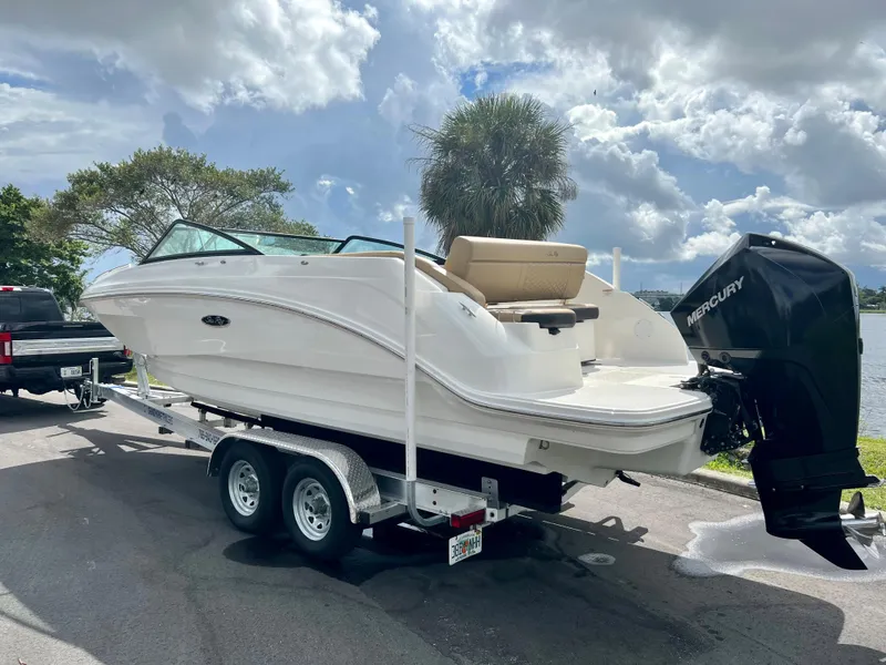 Slide: The Image of 2020 Sea Ray SDX 250 boat on trailer with Mercury outboard motor. - 5