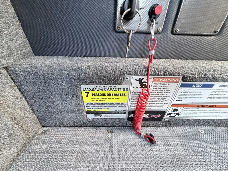 Slide: The Image of Alumacraft Edge 175 Sport 2022 boat capacity label and safety warnings. - 14