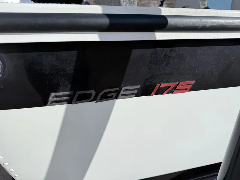 Slide: The Image of Close-up of Alumacraft Edge 175 Sport logo, 2022 model. - 16