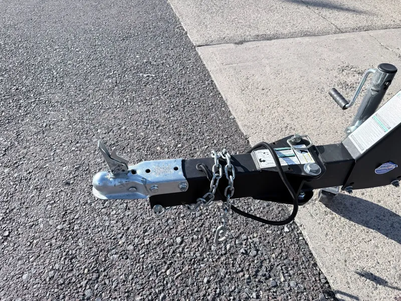 Slide: The Image of Trailer hitch of a 2022 Alumacraft Edge 175 Sport on asphalt. - 28