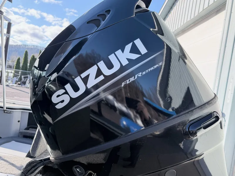 Slide: The Image of Suzuki outboard motor on a 2022 Alumacraft Edge 175 Sport boat. - 29
