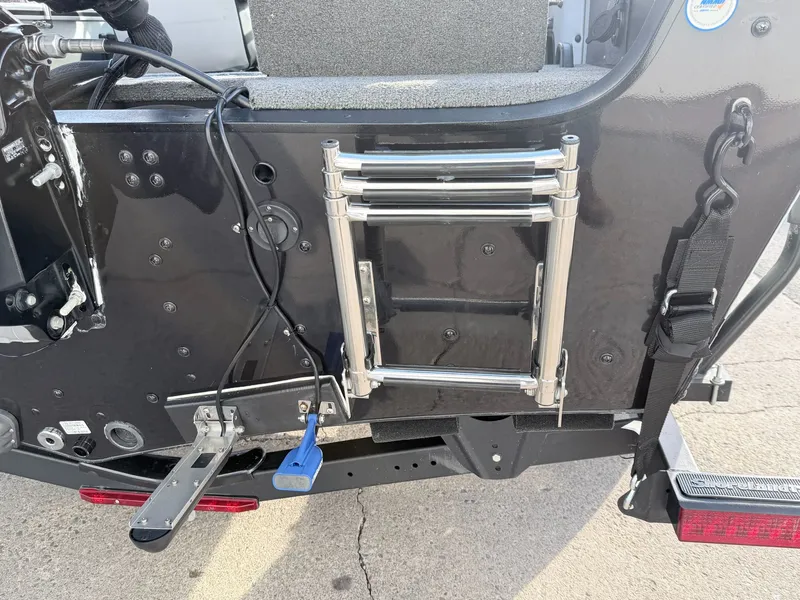 Slide: The Image of Rear view of a 2022 Alumacraft Edge 175 Sport boat with ladder. - 33