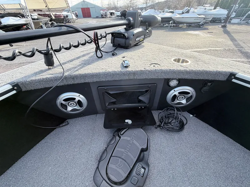 Slide: The Image of Interior of 2022 Alumacraft Edge 175 Sport with speakers and Minn Kota control. - 7